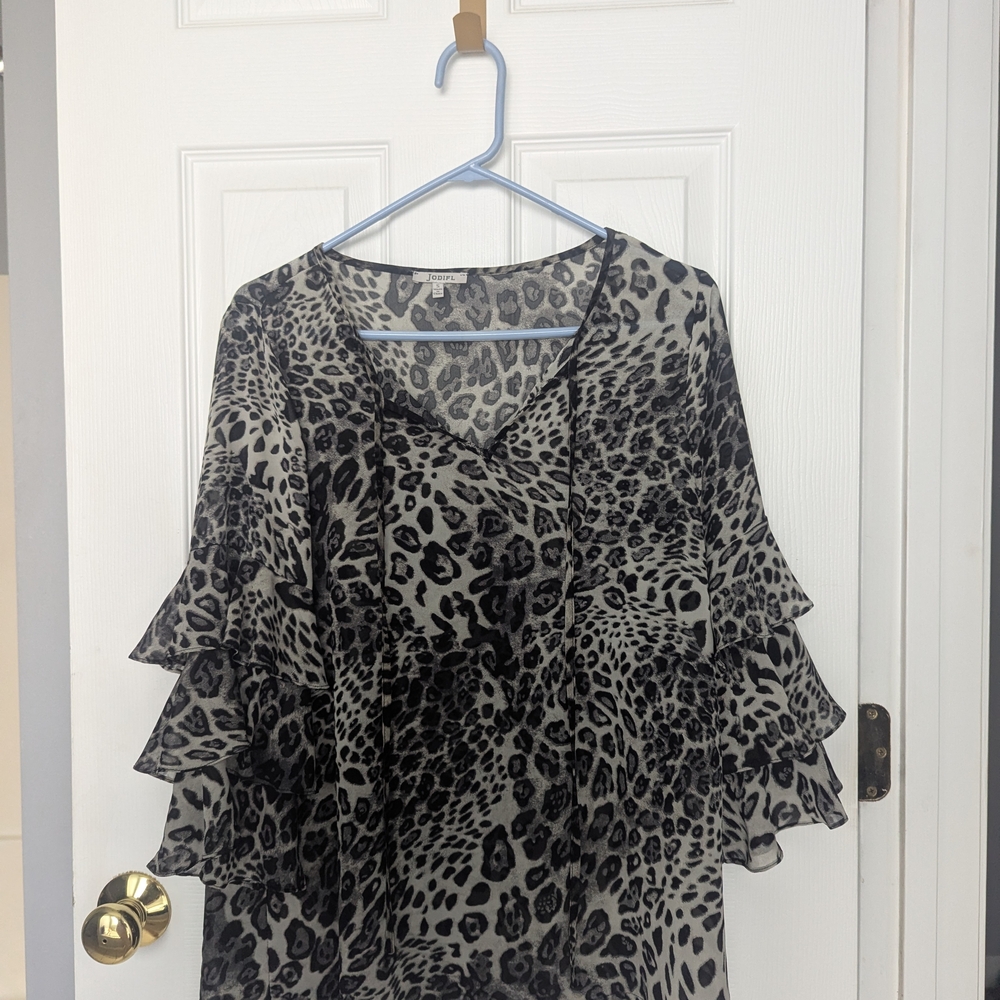 135. Leopard Print Ruffle Sleeve Top